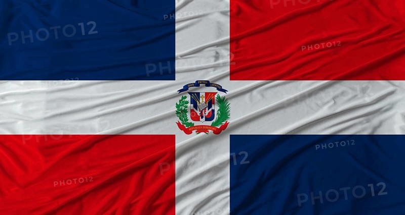 Dominican flag waving. Flag of Dominican Republic with cloth texture