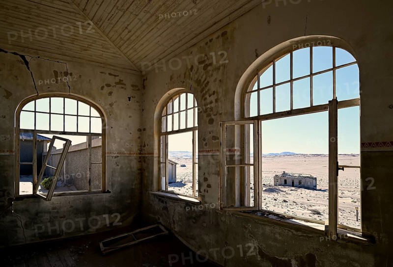 View into the desert from a former dwelling house, Kolmanskuppe, near Lüderitz, Karas Region, Namibia