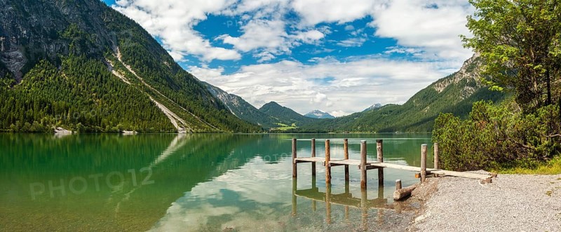 Jetty on Lake Heiterwanger See in the Ammergau Alps, Heiterwang near Reutte, Tyrol, Austria