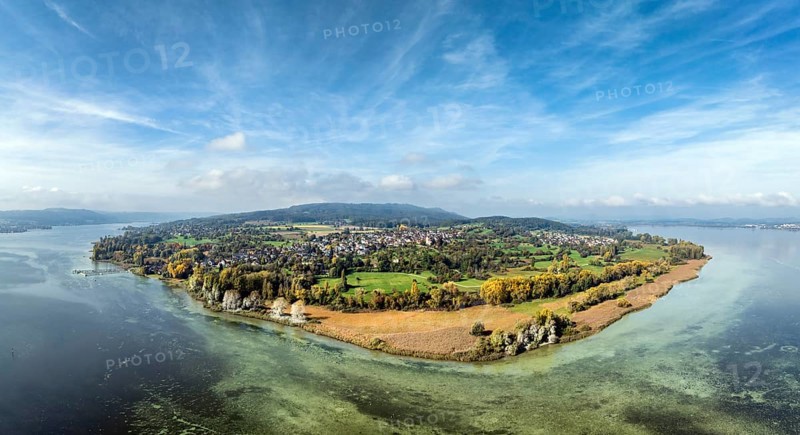 Aerial view, panorama of the Höri peninsula with the headland, called Hornspitze, nature reserve, behind it the village of Horn, on the right on the horizon the town of Radolfzell on Lake Constance, on the left Lake Rhine with the Swiss lakeshore, Gaienhofen, district of Constance, Baden-Württemberg, Germany