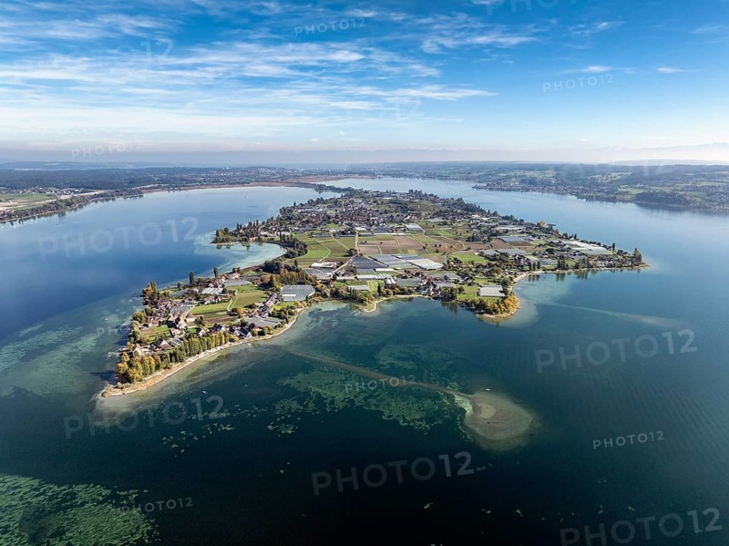 Aerial view of the north-western tip of the island of Reichenau in Lake Constance, with the district of Niederzell and the columned basilica of St Peter and Paul, Windegg Castle on the shore, district of Constance, Baden-Württemberg, Germany