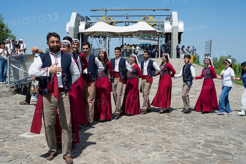 Group in traditional costumes at a festive gathering, folklore, Tatev, Tatev, Syunik province, Syunik, Armenia