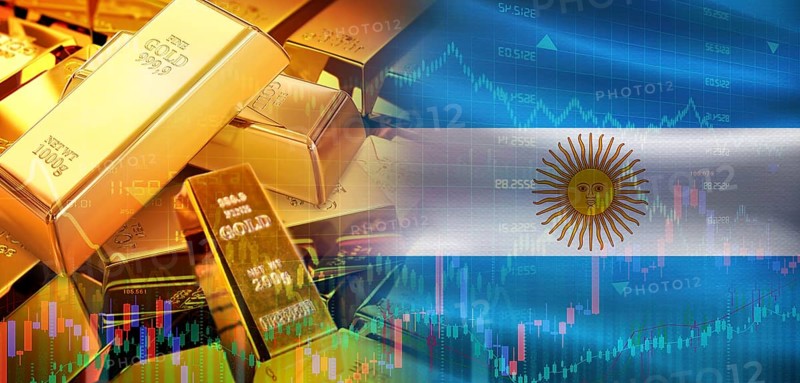 Gold bars stacked on Argentinian flag. Argentina gold reserves, Concept