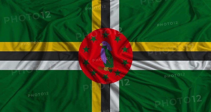 Dominican flag with fabric texture background. National flag of Dominica