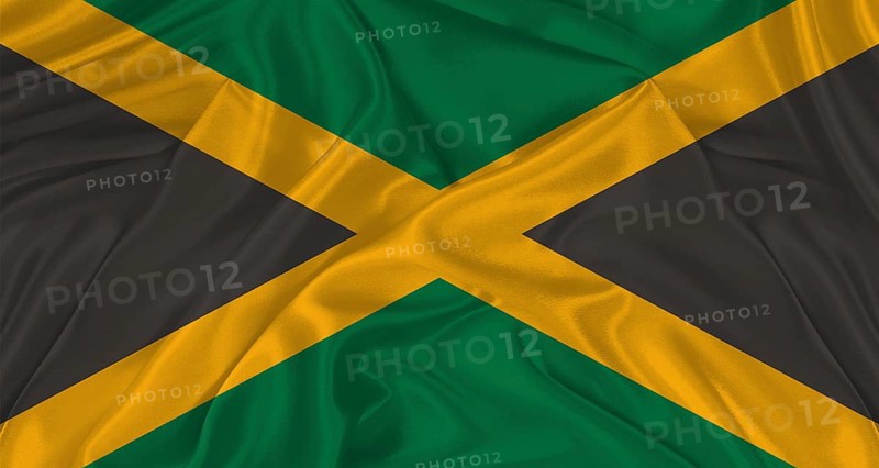 Flag of Jamaica with cloth texture. Close up of Jamaica flag waving