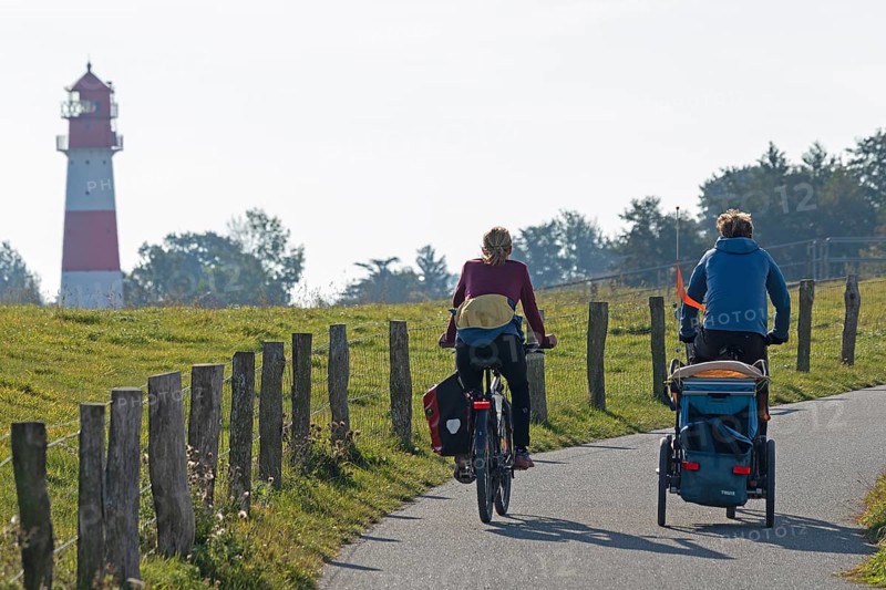 Lighthouse, cyclist, Falshöft, Pommerby, Schleswig-Holstein, Germany