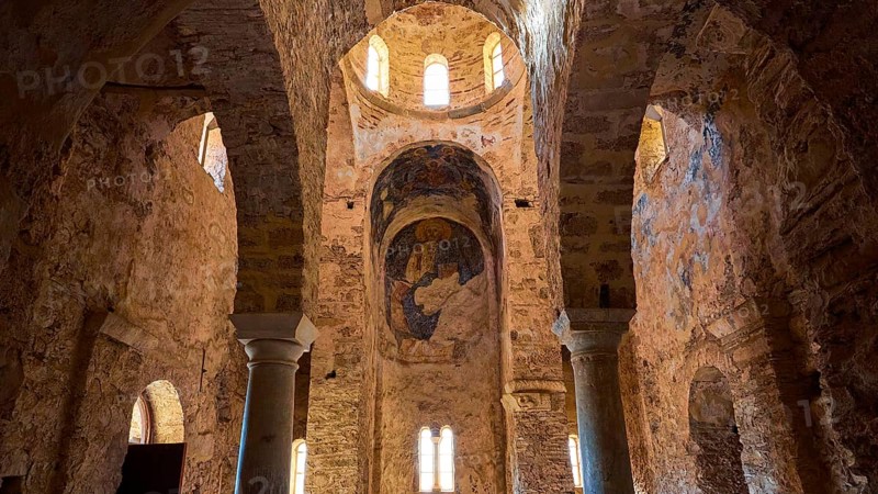 Church of Agia Sophia from the 14th century AD, interior of an old church with round arches and warm light, Mystras, Mistra, UNESCO World Heritage Site, Medieval Byzantine ruined city, north-west of Sparta, foothills of the Tyagetos Mountains, Peloponnese, peninsula, Greece