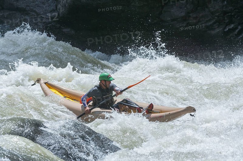 Man kayaking in river, Costa Rica, Central America