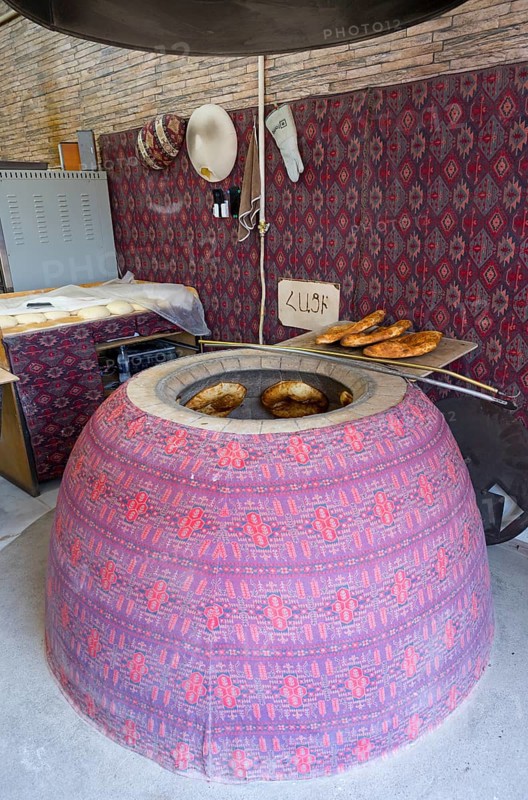 A traditional tandoor oven with bread, ready baked, oven, Tandoor, Tandur, Tonir, Martuni, Gegharkunik province, Armenia