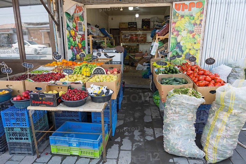 A colourful fruit and vegetable stall with crates and price tags, Martuni, Gegharkunik province, Armenia