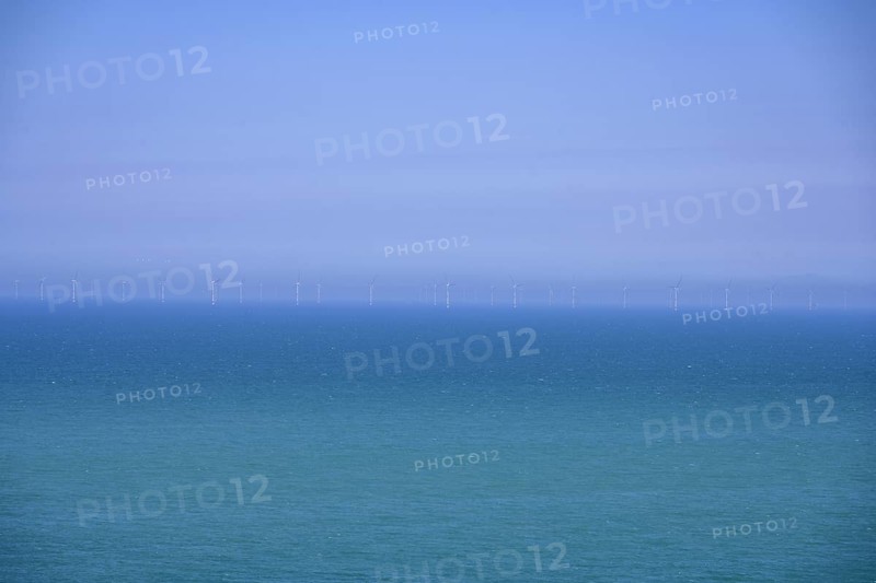 Wind turbines on the sea, hike from Yport to Etretat along the chalk cliff coast, Seine-Maritime department, France