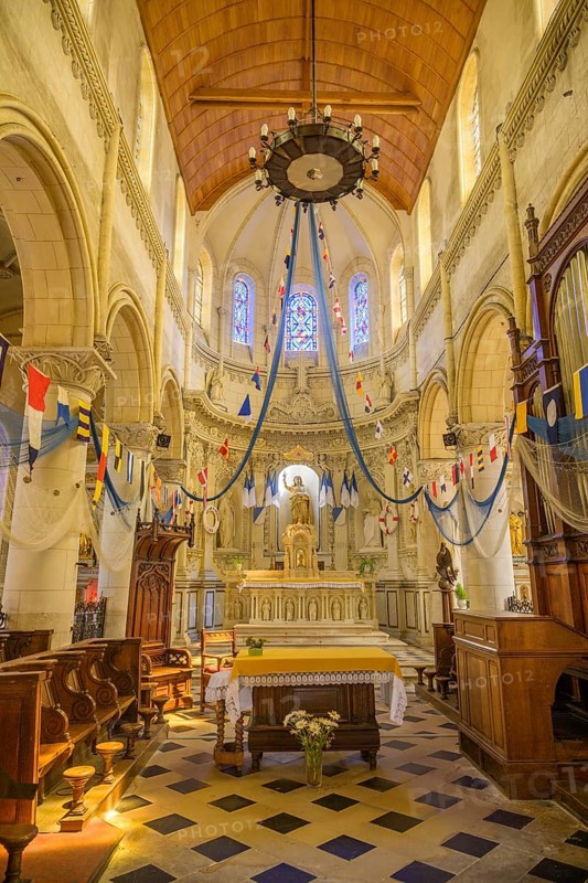 Church of Saint Martin decorated with flags and fishing nets, Yport, Département Seine-Maritime, France