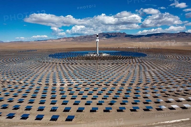 Tonopah, Nevada - The Crescent Dunes Solar Energy Project in the Nevada desert. Ten thousand mirrors reflect sunlight onto a tower where molten salt is heated to produce steam and generate electricity