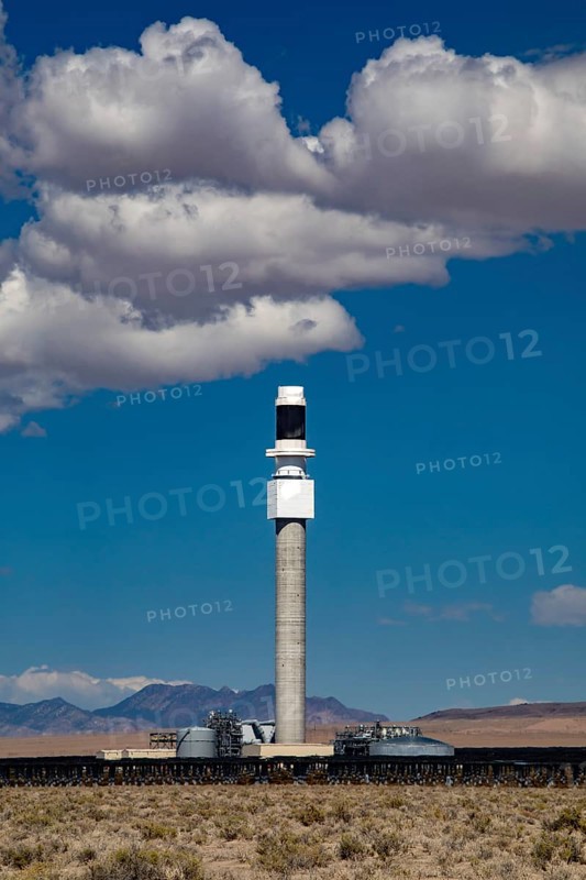 Tonopah, Nevada - The central receiver tower at Crescent Dunes Solar Energy Project in the Nevada desert. Ten thousand mirrors reflect sunlight onto the tower where molten salt is heated to produce steam and generate electricity
