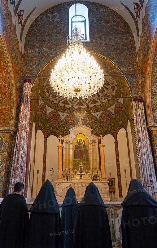 Monks gather in the richly decorated church to pray in front of the altar, Inside the historic, most important Armenian Orthodox cathedral, UNESCO World Heritage Site, Echmiadzin, Echmiadzin, Ejmiacin, Vagharshapat, Vagharshapat, Vagharshapat, Valaršapat, Vagharshapat, Armavir province, Armenia