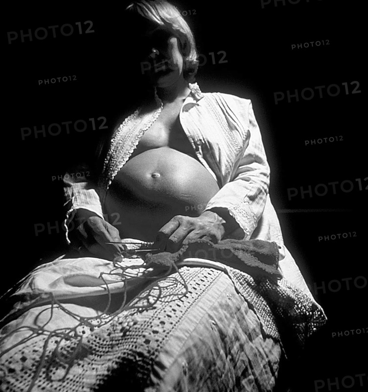 Pregnant woman with knitting, black and white, Bavaria, Germany