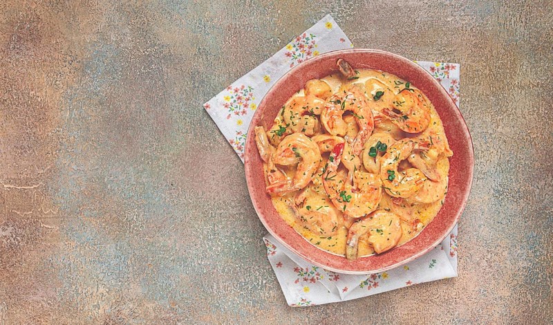 Shrimp in creamy garlic sauce, with spices and herbs