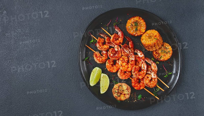 Tiger prawns on skewers, shrimp kebab, with corn, fried, homemade, no people