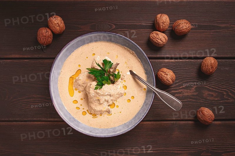 Satsivi, Georgian dish, chicken in nut sauce, cold appetizer, rustic, no people, homemade