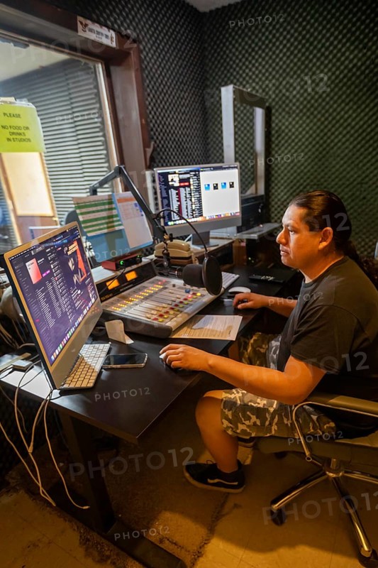 Porcupine, South Dakota - Lucian Little White Man broadcasts on KILI Radio, the voice of the Lakota Nation. The station broadcasts in Lakota and English to the Pine Ridge, Cheyenne River, and Rosebud Indian Reservations. Its finances have been hurt by President Trump's dissolution of the Corporation for Public Broadcasting