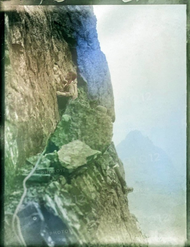 Climber on rocks, Cuillin mountains, Skye, Scotland, UK c 1900-1920 colourised image