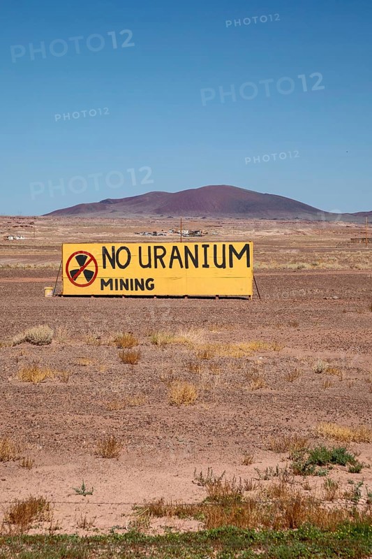 Cameron, Arizona - A sign on the Navajo Nation expresses opposition to Energy Fuels' controversial Pinyon Plain uranium mine, located a few miles from Grand Canyon National Park and inside Baaj Nwaavjo I'tah Kukveni National Monument. Native American tribes fear contamination of ground water and pollution from trucks hauling uranium ore along the 300-mile route to Energy Fuels' White Mesa mill in Utah