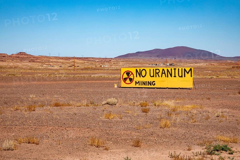 Cameron, Arizona - A sign on the Navajo Nation expresses opposition to Energy Fuels' controversial Pinyon Plain uranium mine, located a few miles from Grand Canyon National Park and inside Baaj Nwaavjo I'tah Kukveni National Monument. Native American tribes fear contamination of ground water and pollution from trucks hauling uranium ore along the 300-mile route to Energy Fuels' White Mesa mill in Utah