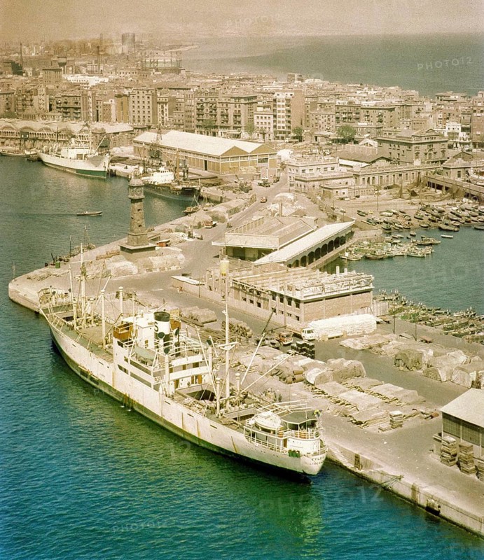 View from cable car of cargo ship 'Fylgia' in port, view to Barceloneta area, city of Barcelona, Spain Europe 1965