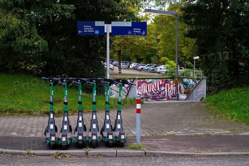 Several e-scooters, electric scooters, scooters parked on the pavement, pavement, in the Bolt bike hire shop, S-Bahn, Sommerrain stop, Stuttgart, Baden-Württemberg, Germany