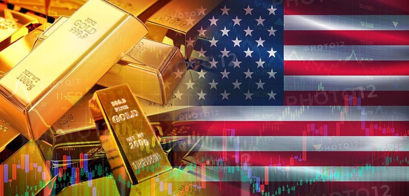 Gold bars stacked on American flag. United States gold reserves, Concept