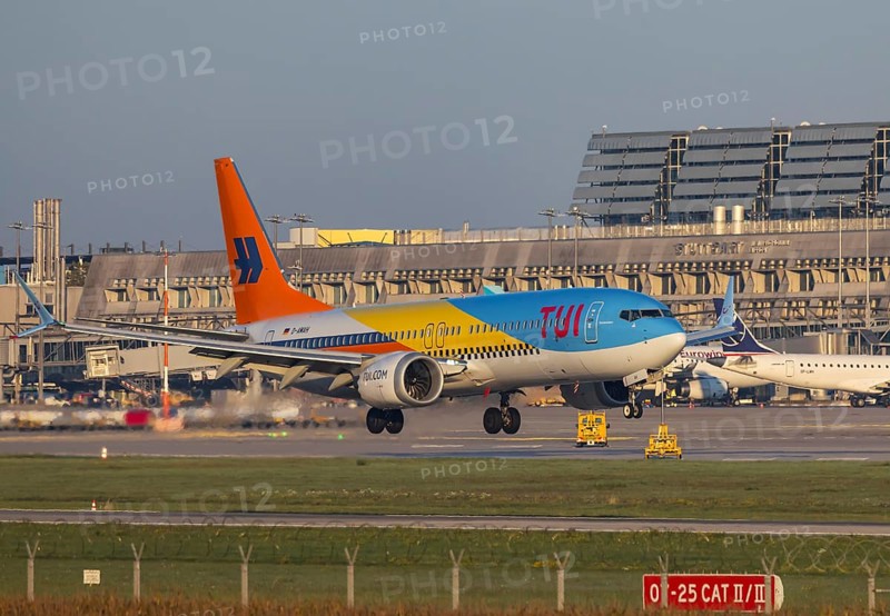 Flight operations at Stuttgart Airport with terminal. Aircraft on landing. Aircraft registration number: D-AMAH, TUIfly, Boeing 737 MAX 8, special livery 50 Years. Stuttgart, Baden-Württemberg, Germany