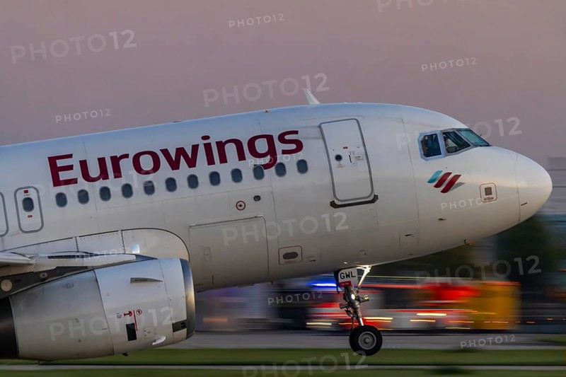 Stuttgart Airport in the early morning. Eurowings aircraft taking off. Close-up. Motion blur. Stuttgart, Baden-Württemberg, Germany