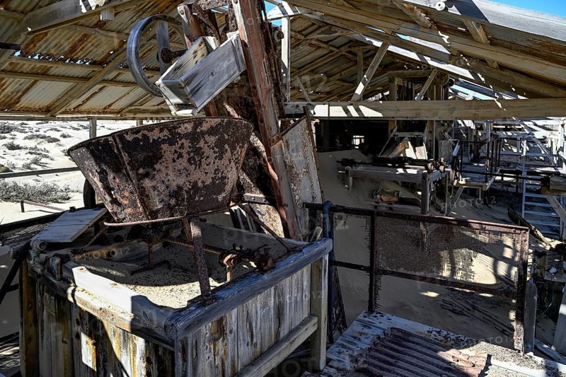 Drum sieve for sieving diamonds in a derelict building, Pomona, restricted diamond area, near Lüderitz, Karas region, Namibia