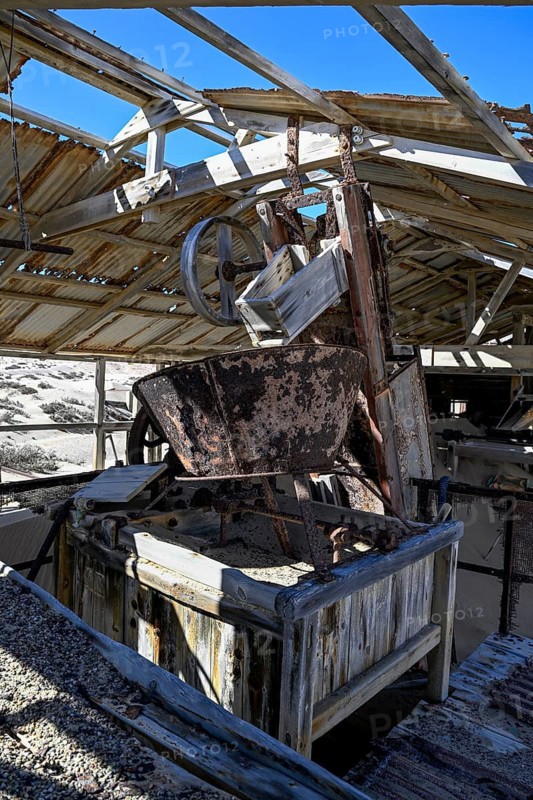 Drum sieve for sieving diamonds in a derelict building, Pomona, restricted diamond area, near Lüderitz, Karas region, Namibia