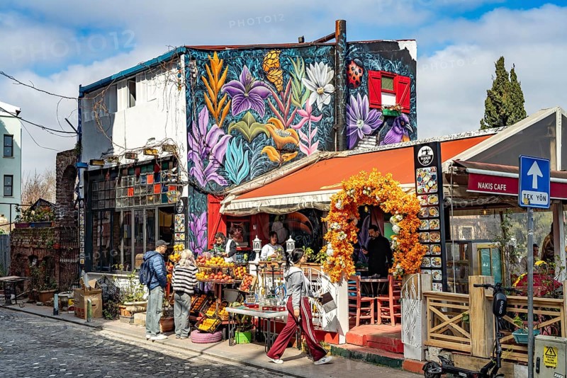 Cafe with graffiti in the colourful Balat district, Istanbul, Turkey