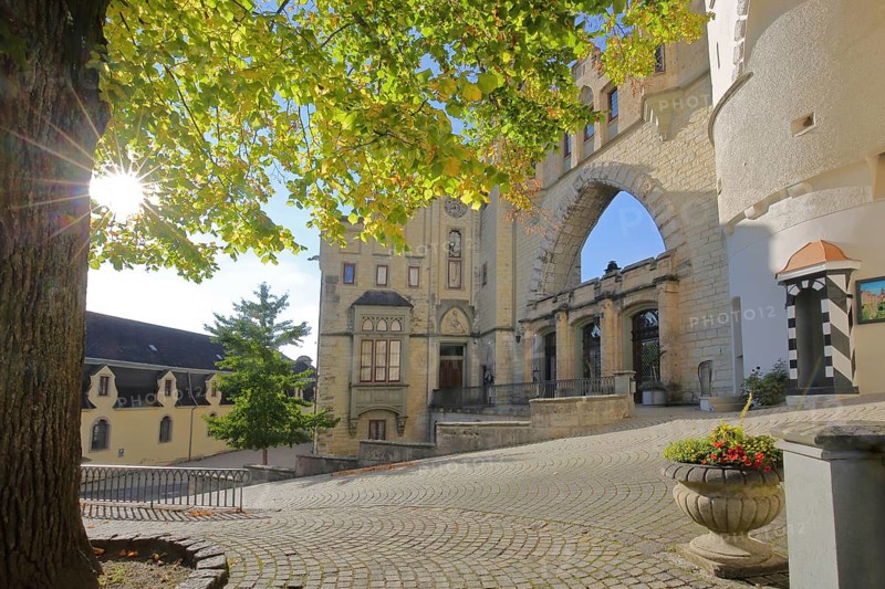 Entrance with portal and backlight to the castle, archway, guardhouse, landmark, mood lighting, Hohenzollern Castle, Sigmaringen Castle, Swabian Alb, Baden-Württemberg, Germany