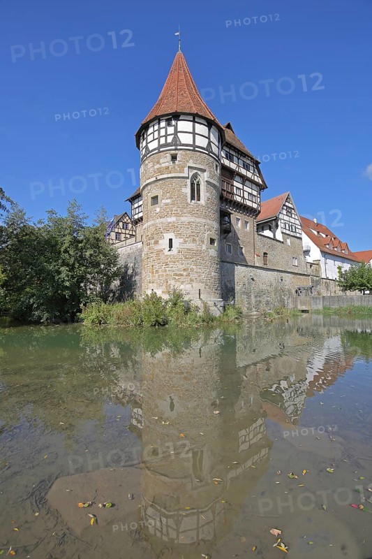Zollern Castle built around 1255 with water tower on the Eybach stream, half-timbered house, reflection, water, castle, Balingen, Swabian Alb, Baden-Württemberg, Germany