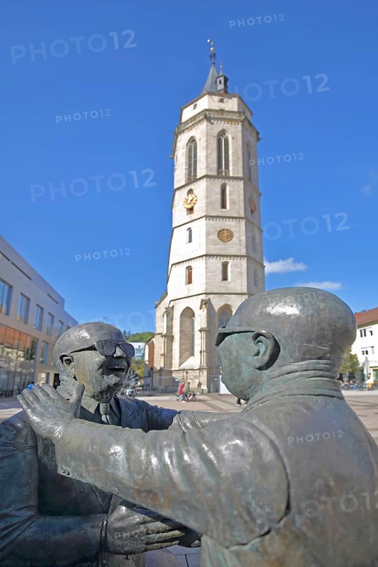 Sculpture Manus manum lavat by Guido Messer 1986 - One hand washes the other, two, bronze sculptures, male figures, modern art, symbol for deal, agreement, trade, contract, shake hands, give, joy, greet, hug, gesture, arms, faces, landmark town church, Balingen, Swabian Alb, Baden-Württemberg, Germany