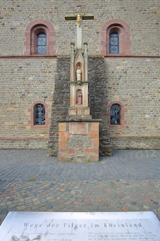 Way of St James at the collegiate church of St Chrysanthus and Daria, crucifix, information, text, pilgrimage, Way of St James, pilgrimage, hiking trail, Rhineland, Bad Münstereifel, Ahrgebirge, Eifel, North Rhine-Westphalia, Germany