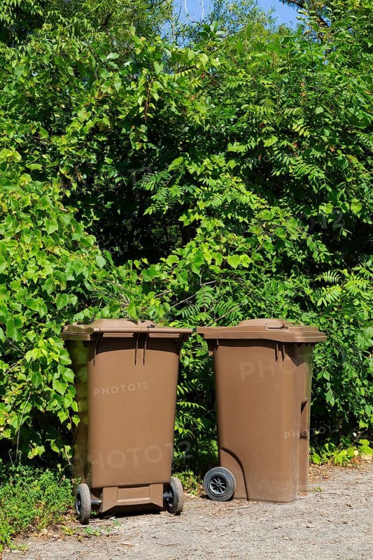Brown plastic portable composting bins for depositing organic materials and leftover foods in, Quebec, Canada