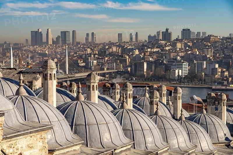 View over the roofs of the Süleymaniye Mosque to the skyline of Istanbul, Turkey