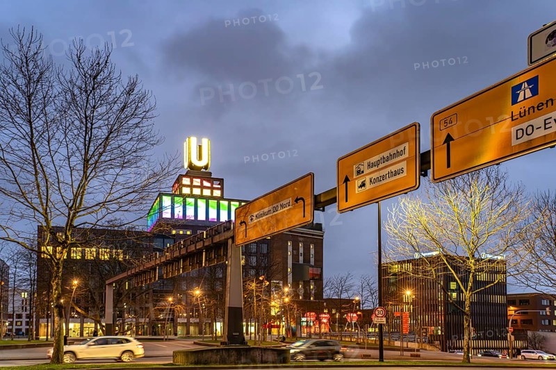Traffic signs at Wallring and Dortmund's landmark U, Centre for Art and Creativity at dusk, Dortmund, North Rhine-Westphalia, Germany
