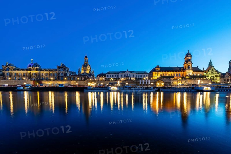 Old town skyline with Brühl's Terraces, Kunstakademie, Church of Our Lady, Residenzschloss, Higher Regional Court, paddle steamer on the Elbe in the blue hour, reflection, Dresden, Saxony, Germany
