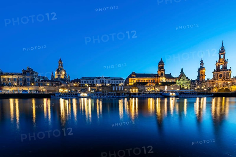 Old town skyline with Brühl's Terraces, Church of Our Lady, Academy of Fine Arts, Cathedral Sanctissimae Trinitatis, Higher Regional Court, paddle steamer on the Elbe in the blue hour, reflection, Dresden, Saxony, Germany