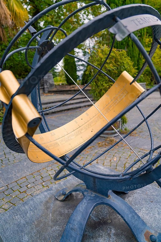 Detail of a decorative metal sundial standing in a park, Mainau Island, Lake Constance, Germany