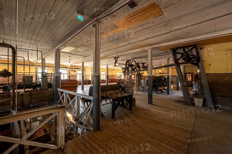 Factory hall with historical machines for the production of cardboard and paper, former paper factory and mill for the production of groundwood pulp board, UNESCO World Heritage Site Verla Factory Village, Maailmanperintökohde Verlan puuhiomo ja pahvitehdas, Verla Rapids, Kymenlaakso, near Kouvola, Finland