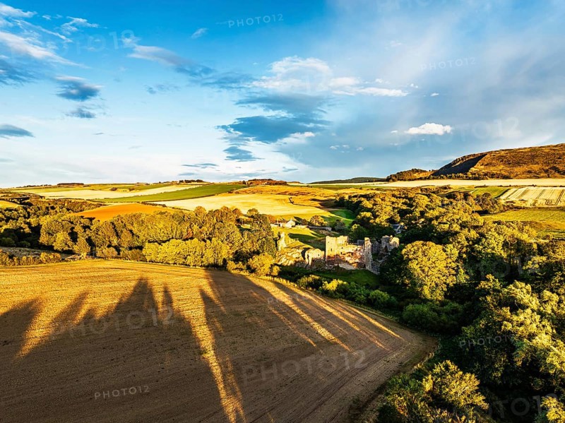 Ruins of Hailes Castle over River Tyne from a drone, East Linton, East Lothian, Scotland, UK