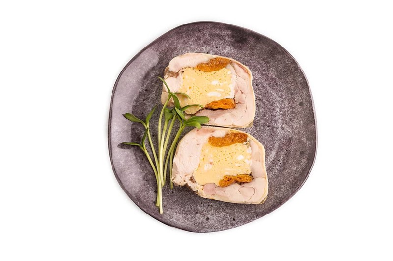 Chicken, egg and dried apricot meatloaf isolated on white. Diet, healthy eating. top view, copy space