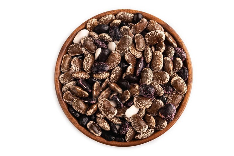 Wooden bowl with Kidney beans isolated on white background, top view, flat lay, close up, minimalism