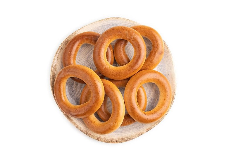 Homemade Ring Bagel isolated on white background. top view, flat lay, close up